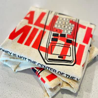 a piece of cloth with a cell phone on it