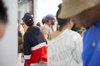 a group of people standing in a line